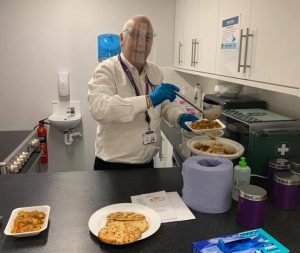 Rob Harris teaching participants how to cook a vegetable curry - The Pioneer Group